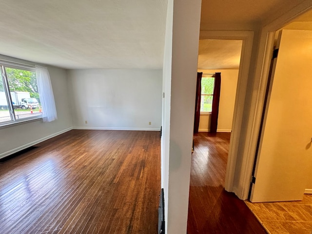 184 Mason St, Mansfield, OH 44902 - empty room featuring wood finished floors and plenty of natural light