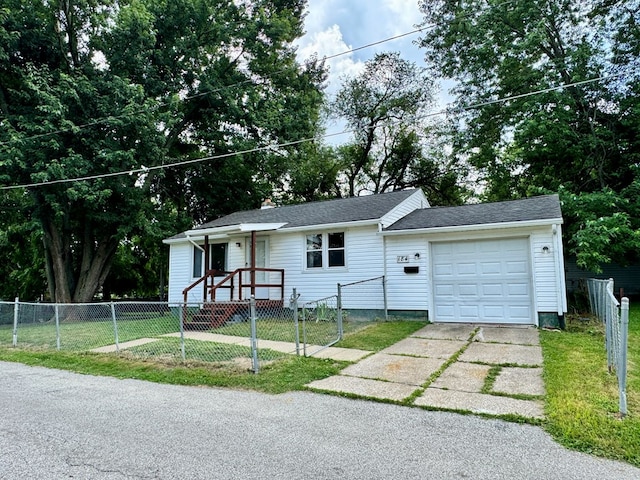 184 Mason St, Mansfield, OH 44902 - ranch-style house featuring driveway, an attached garage, a fenced front yard, and a gate