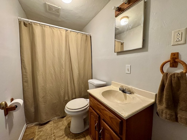 184 Mason St, Mansfield, OH 44902 - bathroom featuring vanity, stone finish floors, and a shower with curtain