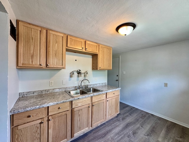 184 Mason St, Mansfield, OH 44902 - kitchen with dark wood-style flooring, light countertops, and a textured ceiling