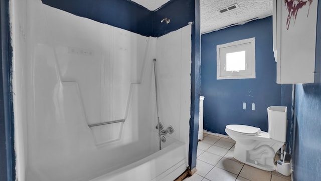 bathroom with tile patterned floors, visible vents, toilet, a textured ceiling, and shower / bath combination