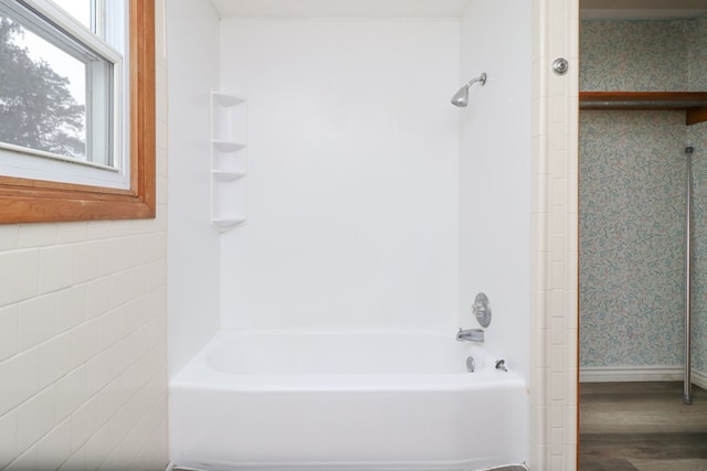 bathroom with hardwood / wood-style floors