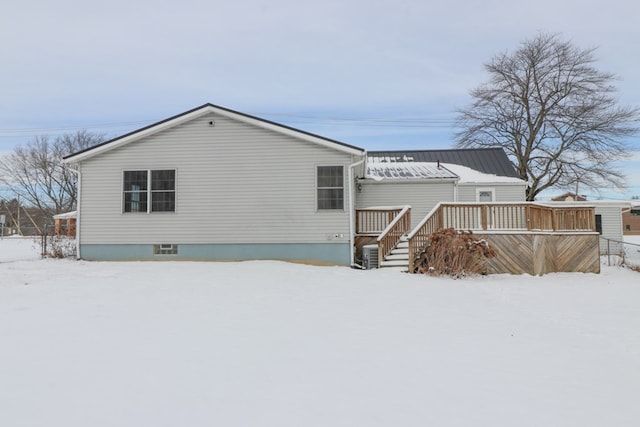 view of snow covered property