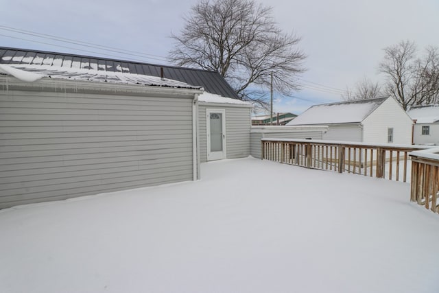 view of snow covered deck