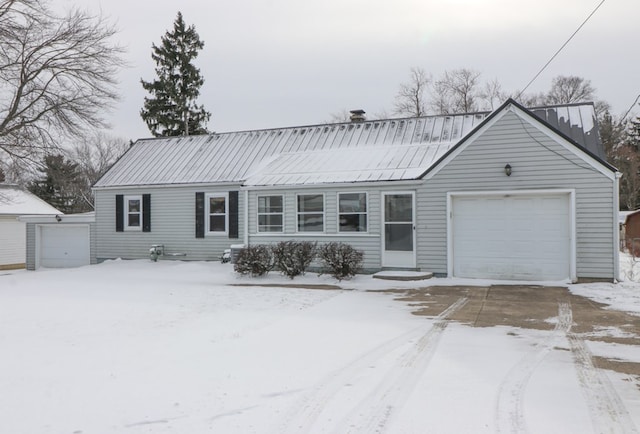 view of front of property with a garage