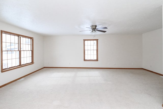 empty room featuring ceiling fan