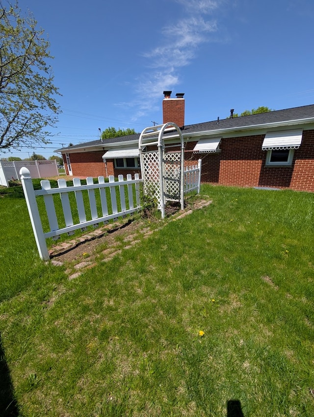 view of yard with fence