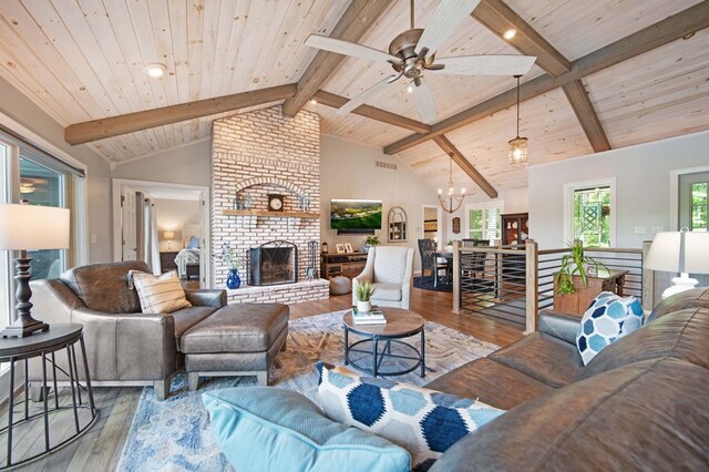 7326 State Route 19 Unit 27-30, Mount Gilead, OH 43338 - living area with hardwood / wood-style flooring, wooden ceiling, ceiling fan, a fireplace, and a chandelier