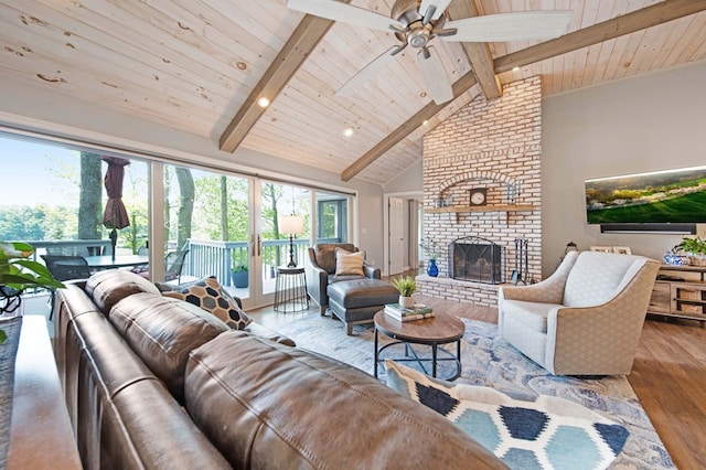 7326 State Route 19 Unit 27-30, Mount Gilead, OH 43338 - living room featuring wood finished floors, a brick fireplace, a wood ceiling with exposed beams, ceiling fan, and high vaulted ceiling