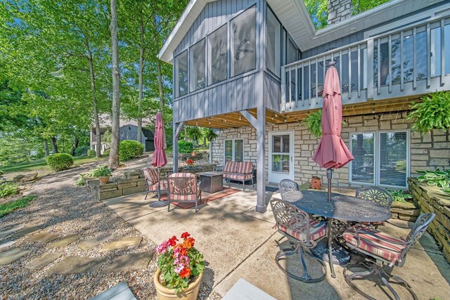 7326 State Route 19 Unit 27-30, Mount Gilead, OH 43338 - view of patio / terrace featuring a sunroom and outdoor dining space