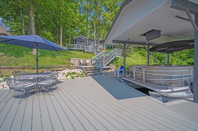 7326 State Route 19 Unit 27-30, Mount Gilead, OH 43338 - dock area with stairway, a deck, and outdoor dining space