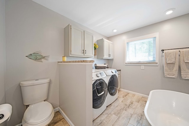 7326 State Route 19 Unit 27-30, Mount Gilead, OH 43338 - laundry room featuring washer and clothes dryer and light wood finished floors