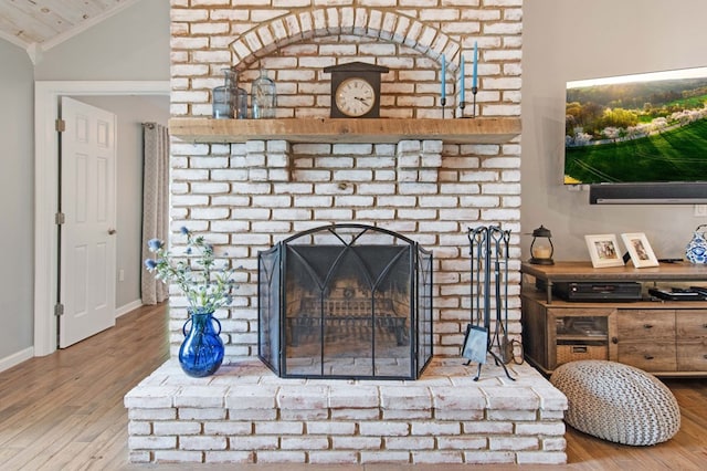 7326 State Route 19 Unit 27-30, Mount Gilead, OH 43338 - detailed view of wood finished floors, a fireplace, and crown molding