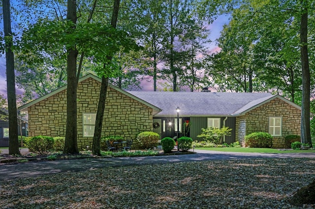 7326 State Route 19 Unit 27-30, Mount Gilead, OH 43338 - view of front of home featuring stone siding, a shingled roof, and board and batten siding