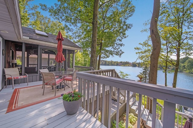 7326 State Route 19 Unit 27-30, Mount Gilead, OH 43338 - deck with a water view, outdoor dining space, and a sunroom