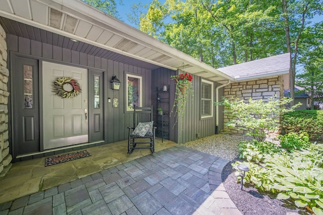 7326 State Route 19 Unit 27-30, Mount Gilead, OH 43338 - doorway to property with board and batten siding, covered porch, and roof with shingles