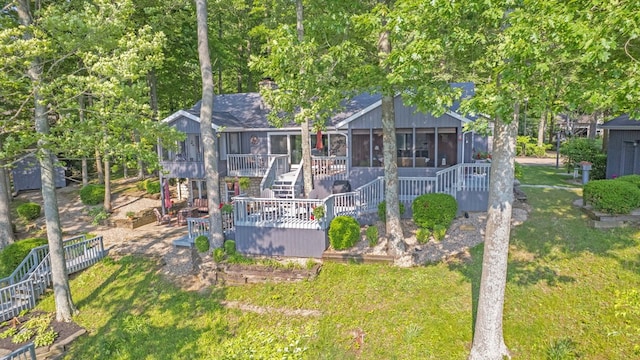 7326 State Route 19 Unit 27-30, Mount Gilead, OH 43338 - view of front facade featuring stairway, a sunroom, a front yard, a chimney, and a patio