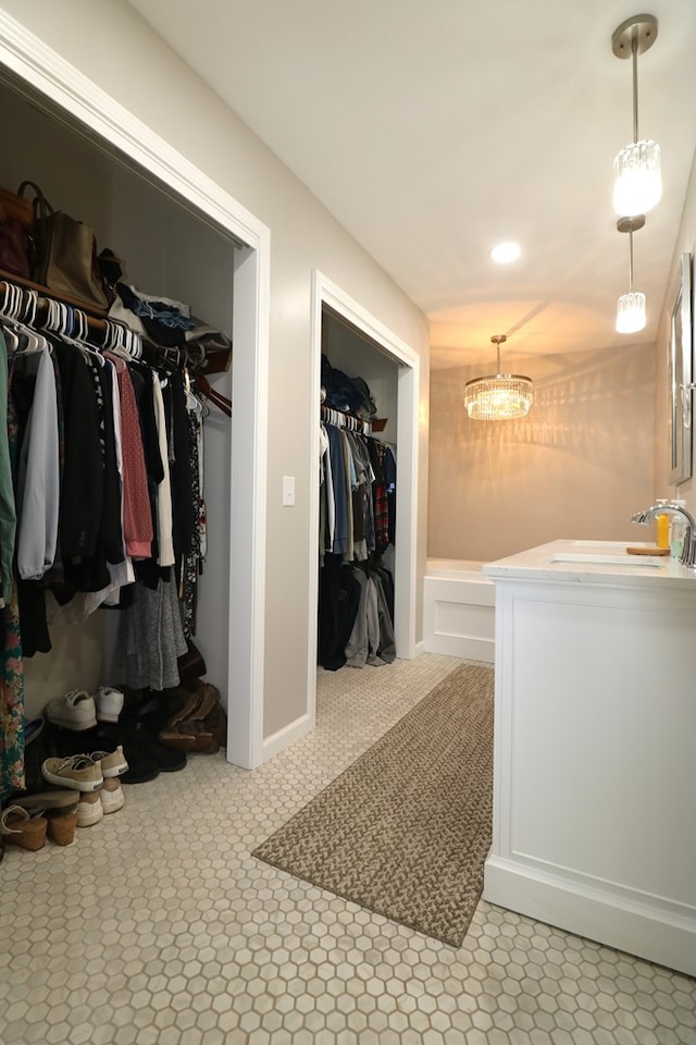 4107 State Route 113, Milan, OH 44846 - interior space with a spacious closet, recessed lighting, and vanity