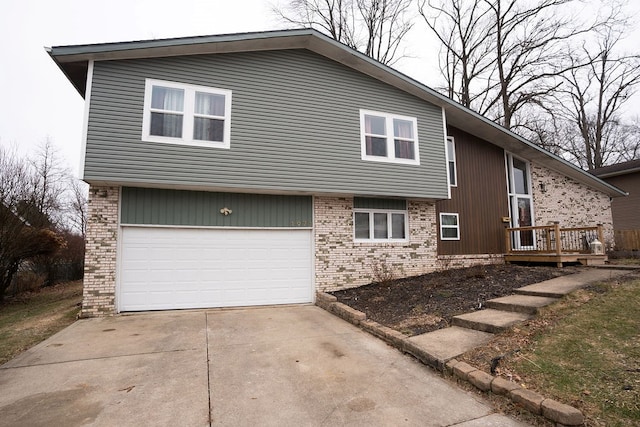 view of front of property with a wooden deck and a garage