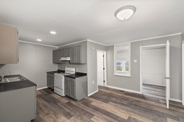 kitchen with under cabinet range hood, a sink, gray cabinets, white range with electric stovetop, and crown molding