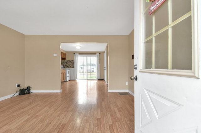 interior space with light hardwood / wood-style floors