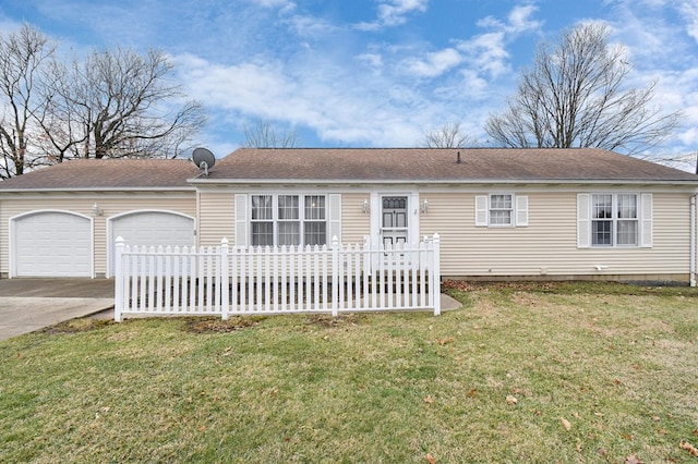 ranch-style home with a garage and a front yard