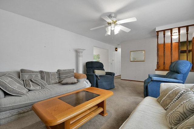 carpeted living room featuring ceiling fan