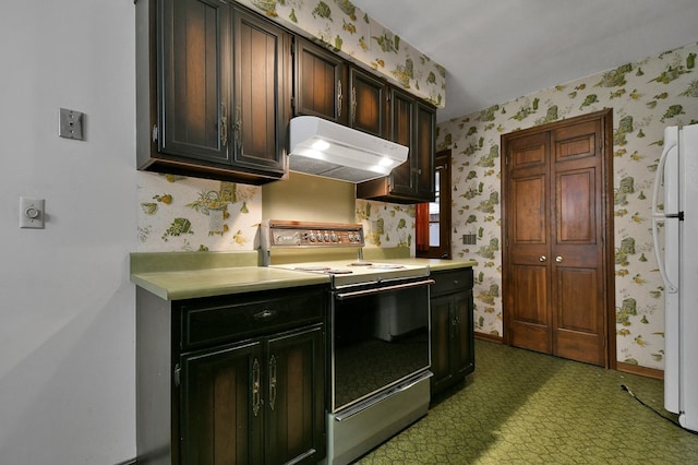 kitchen featuring range with electric stovetop and white refrigerator