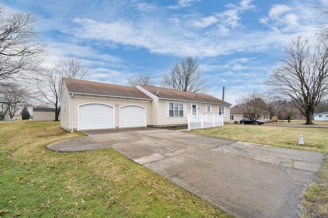 view of front facade featuring a garage and a front lawn