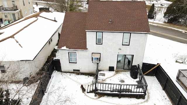 view of snow covered house