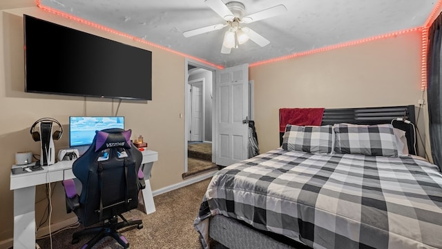 carpeted bedroom with ceiling fan