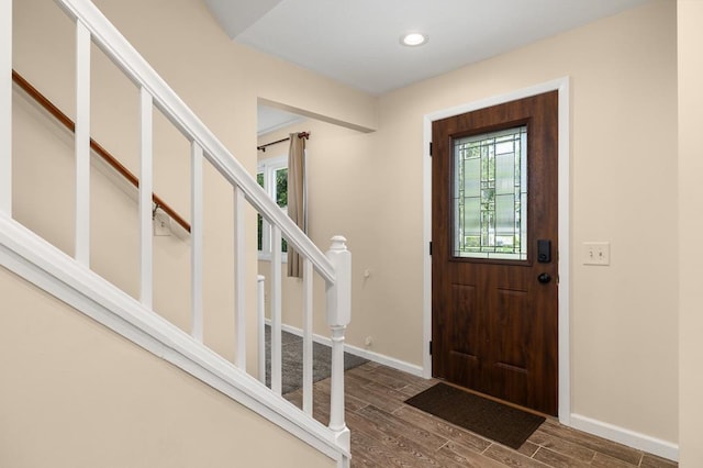 828 Longmeadow Ln, Findlay, OH 45840 - foyer entrance featuring baseboards, wood finished floors, stairs, and recessed lighting