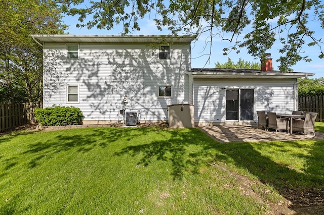 828 Longmeadow Ln, Findlay, OH 45840 - back of house with a patio, a chimney, and central air condition unit