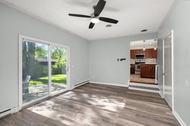 828 Longmeadow Ln, Findlay, OH 45840 - unfurnished living room with a baseboard radiator, crown molding, wood finished floors, ceiling fan, and baseboards