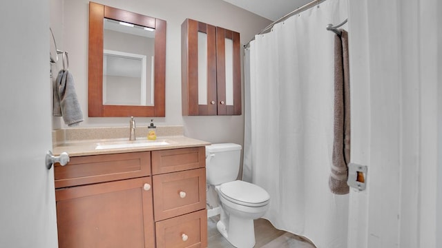828 Longmeadow Ln, Findlay, OH 45840 - bathroom with toilet, vanity, and curtained shower