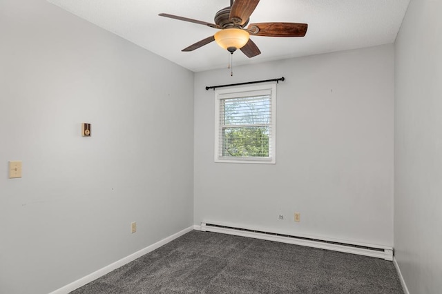 828 Longmeadow Ln, Findlay, OH 45840 - spare room with baseboard heating, dark colored carpet, ceiling fan, and baseboards
