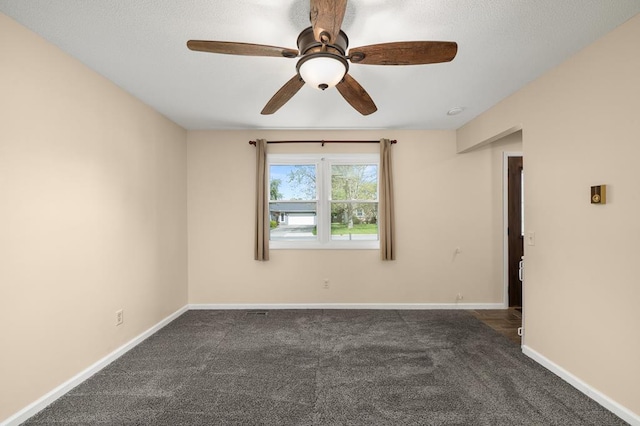 828 Longmeadow Ln, Findlay, OH 45840 - empty room with dark carpet, a ceiling fan, and baseboards
