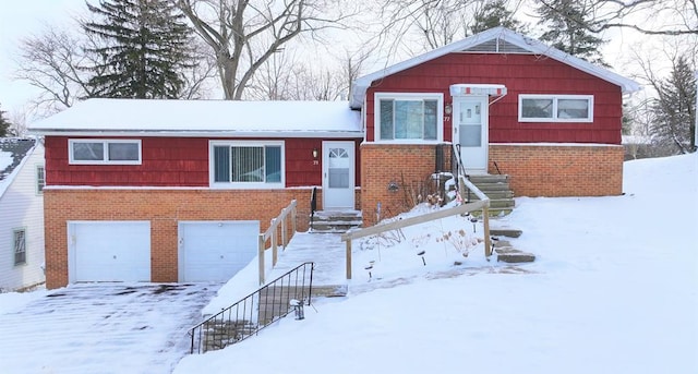 view of front of home with a garage