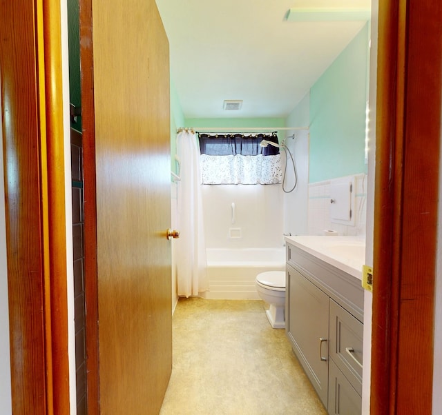 full bathroom featuring vanity, toilet, and shower / bath combo with shower curtain