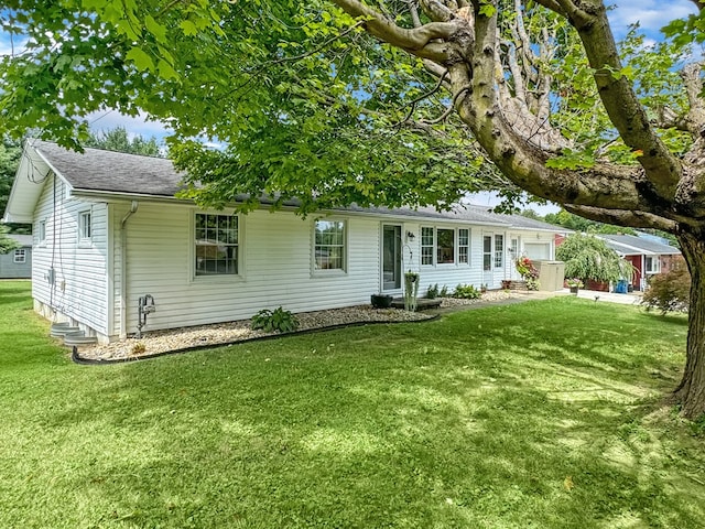 ranch-style home with a front yard