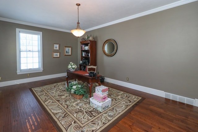 office featuring crown molding, wood finished floors, baseboards, and visible vents