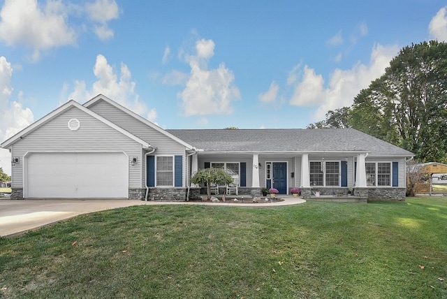 ranch-style home with a garage and a front lawn