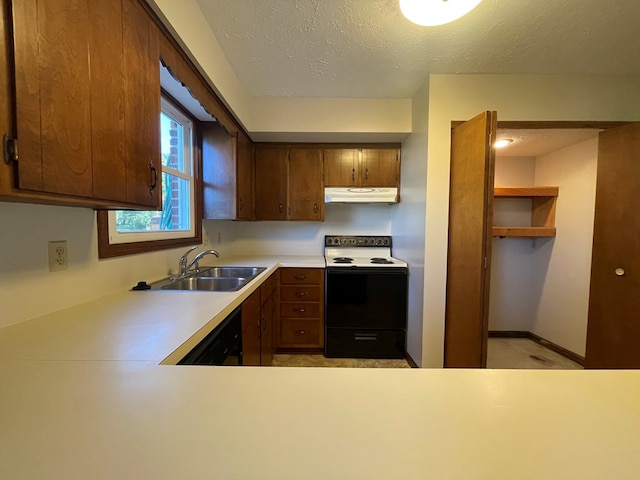 71 Taft St, Shelby, OH 44875 - kitchen with electric range oven, under cabinet range hood, a sink, light countertops, and a textured ceiling