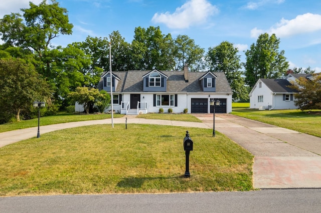 cape cod home with a garage, concrete driveway, and a front yard