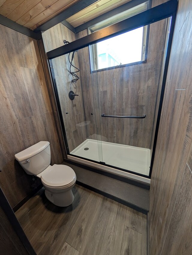 115 N Main St, Mount Gilead, OH 43338 - full bath with wood finished floors, toilet, and a shower with shower door