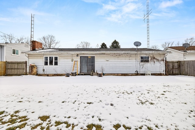 view of snow covered property