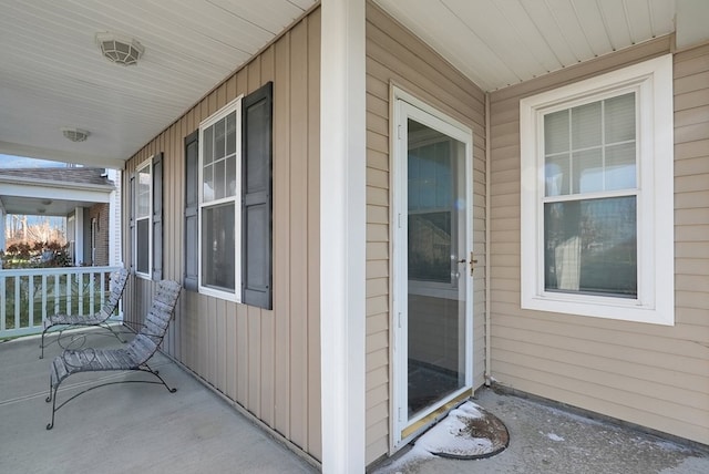 entrance to property with covered porch