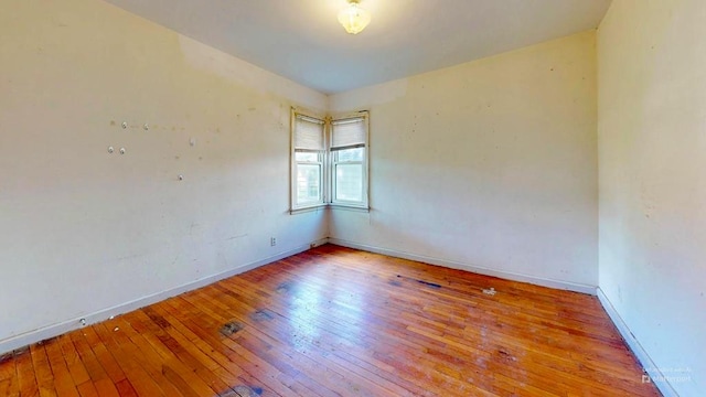 729 Keen Ave, Ashland, OH 44805 - spare room with wood-type flooring and baseboards