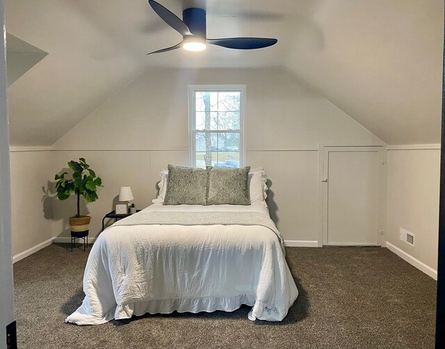 bedroom with vaulted ceiling, carpet, visible vents, and baseboards
