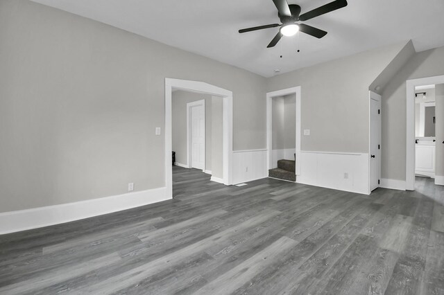 44 W 4th St, Fredericktown, OH 43019 - unfurnished living room with a ceiling fan and dark wood-style flooring
